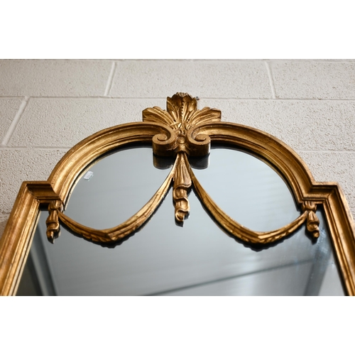 159 - A pair of large wall mirrors with decorative carved and moulded giltwood frames, 130 x 61 cm