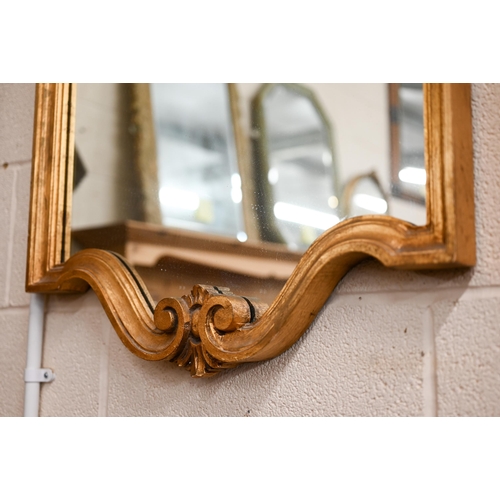 159 - A pair of large wall mirrors with decorative carved and moulded giltwood frames, 130 x 61 cm