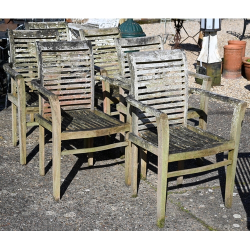 17 - A weathered teak rectangular garden table with six armchairs, the table 160 x 90 x 75 cm high table ... 