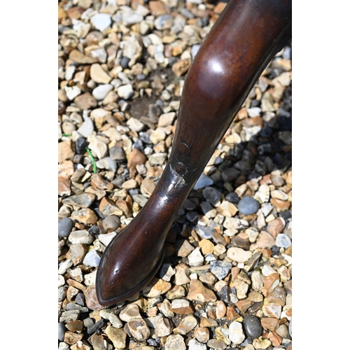 171 - A 19th century mahogany tilt-top table on gun barrel turned column and triform supports