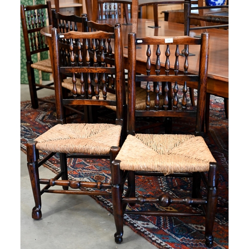 173 - A set of six turned spindle-back Lancashire elm and rush-seated dining chairs (6)