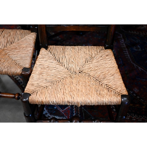 173 - A set of six turned spindle-back Lancashire elm and rush-seated dining chairs (6)