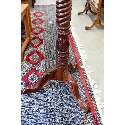 174 - A spiral turned and carved hardwood jardiniere stand, 130 cm high