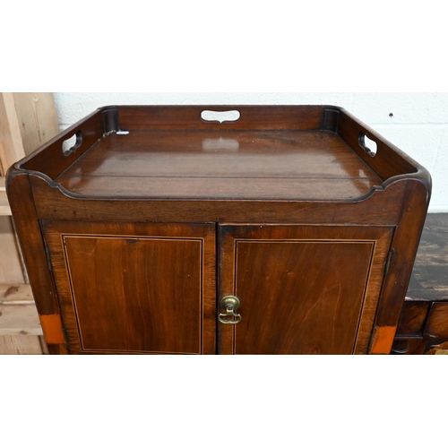 187 - An antique mahogany two-door nightstand on moulded square supports, 50 x 40 x 73 cm high