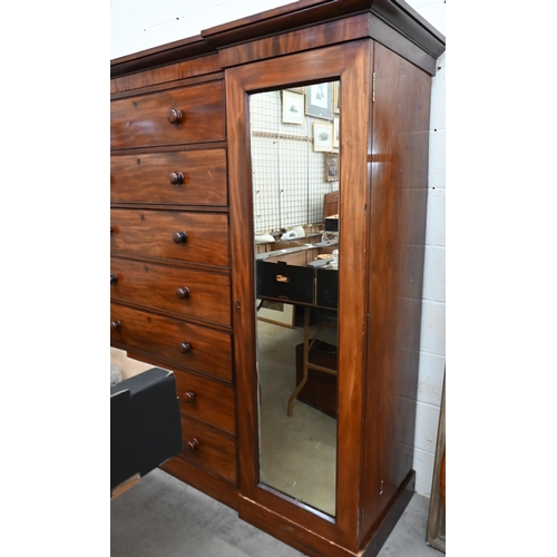 192 - A 19th century mahogany inverted breakfront compactum wardrobe with seven central drawers flanked by... 