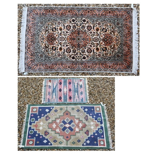 194 - An Indian part silk floral rug, 165 x 93 cm to/w two geometric design kelims, 96 x 63 cm and 161 x 8... 