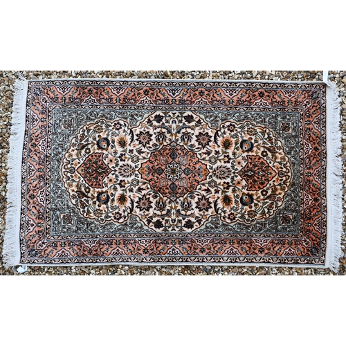 194 - An Indian part silk floral rug, 165 x 93 cm to/w two geometric design kelims, 96 x 63 cm and 161 x 8... 