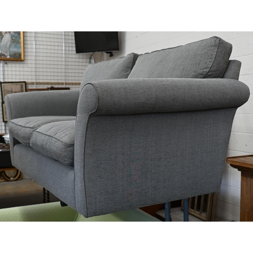 199 - A modern two-seater scroll arm sofa with grey fabric upholstery, 176 x 90 x 80 cm high