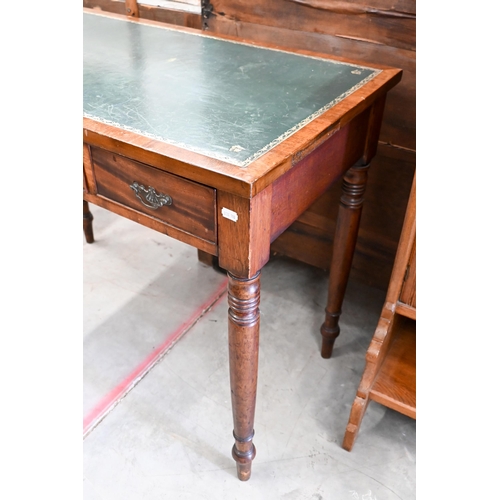 205 - A 19th century mahogany three drawer writing table with gilt tooled leather top and turned supports,... 