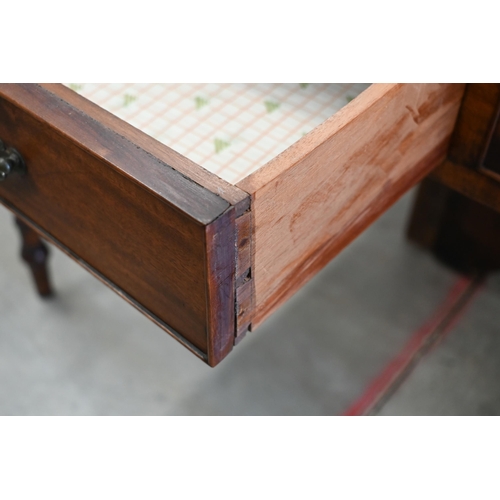 205 - A 19th century mahogany three drawer writing table with gilt tooled leather top and turned supports,... 