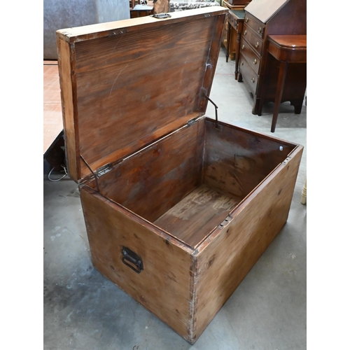 211 - An antique pine trunk with iron side handles, 92 x 60 x 58 cm high