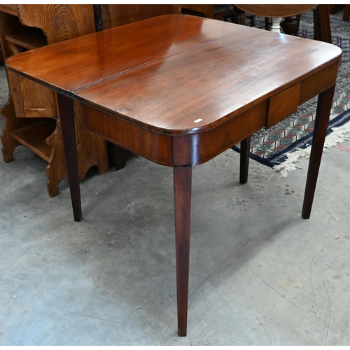 212 - A 19th century mahogany folding tea table, 90- x 43 x 76 cm high