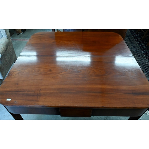 212 - A 19th century mahogany folding tea table, 90- x 43 x 76 cm high