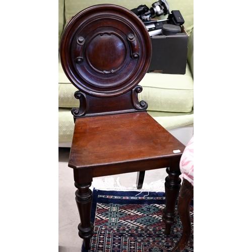 214 - A Victorian carved walnut balloon back side chair to/w a 19th century mahogany hall chair a/f (2)