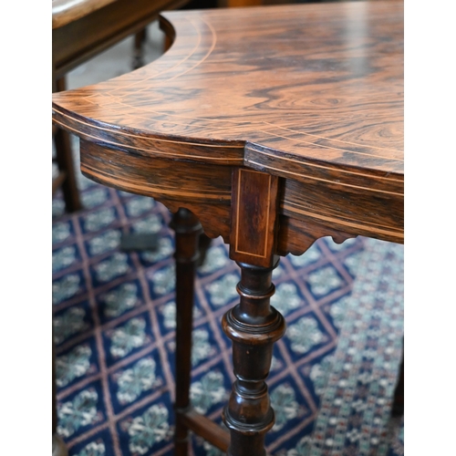 219 - An Edwardian rosewood side table with cartouche-shaped top on slender turned supports with curved st... 