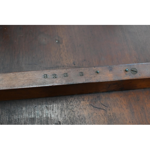 219 - An Edwardian rosewood side table with cartouche-shaped top on slender turned supports with curved st... 