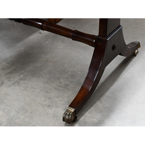 227 - A Regency mahogany sofa table with two drawers, rectangular supports with splayed legs terminating i... 