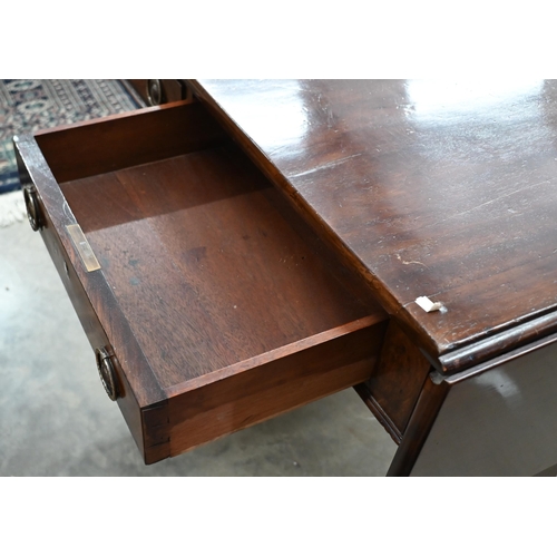 227 - A Regency mahogany sofa table with two drawers, rectangular supports with splayed legs terminating i... 