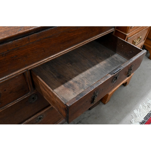 229 - #A Georgian oak fall front bureau with two short over two long drawers raised on bracket feet, 94 x ... 