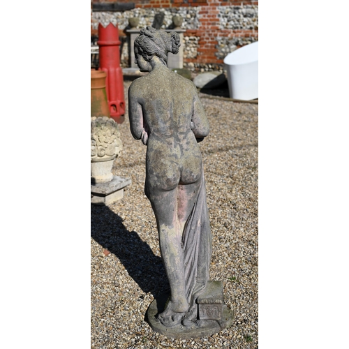 23 - A classically styled weathered cast stone garden figure, 117 cm h 