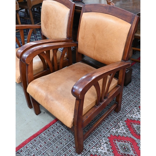 235 - A pair of stained hardwood and tan leather open armchairs in the Art-Deco manner