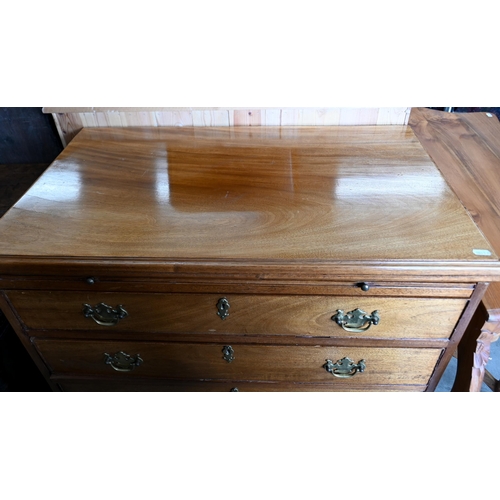 242 - A George III mahogany chest of  four long drawers below a full width brushing slide, raised on brack... 