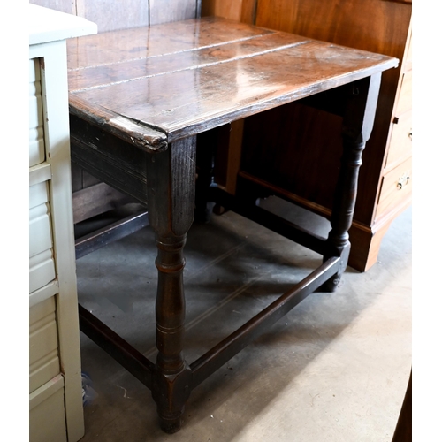 243 - A 17th century oak side table, jointed construction with turned  supports and stretchers, 80 cm x 60... 