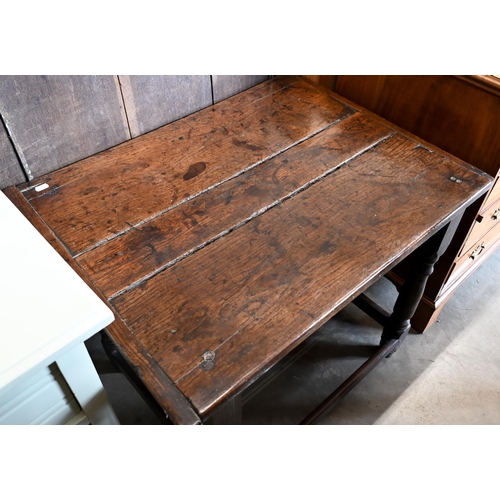 243 - A 17th century oak side table, jointed construction with turned  supports and stretchers, 80 cm x 60... 