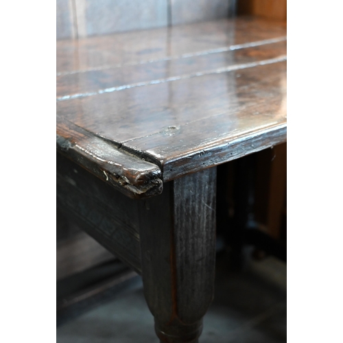 243 - A 17th century oak side table, jointed construction with turned  supports and stretchers, 80 cm x 60... 