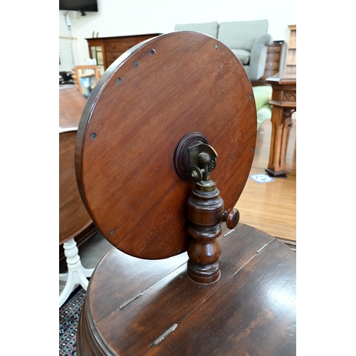 245 - A Victorian mahogany shaving/vanity stand with twin hinged storage compartments, adjustable mirror a... 