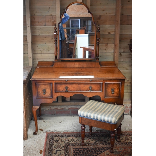 253 - A walnut mirror-backed dressing table with brush slide and three drawers on cabriole supports, 118 c... 