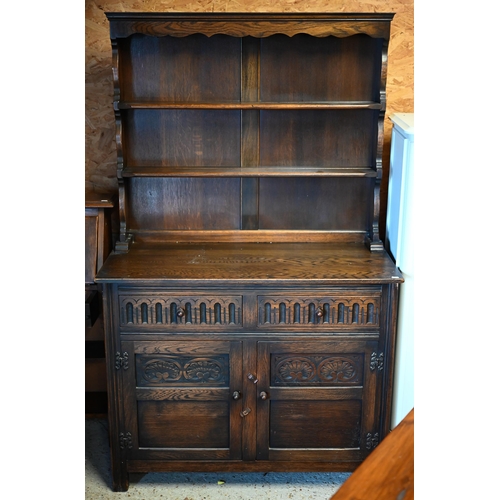 261 - An Old Charm style carved oak dresser, 108 x 48 x 175 cm h