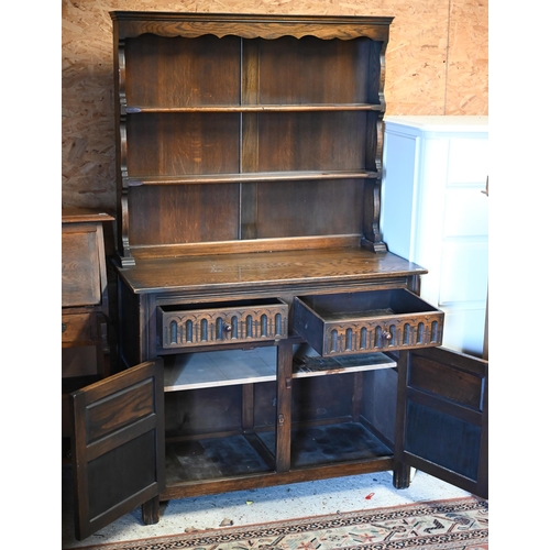 261 - An Old Charm style carved oak dresser, 108 x 48 x 175 cm h