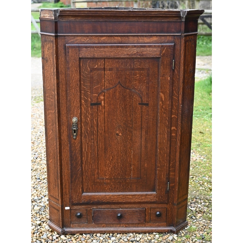 269 - A Georgian oak hanging corner cupboard a/f, 80 x 120 cm