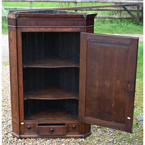 269 - A Georgian oak hanging corner cupboard a/f, 80 x 120 cm