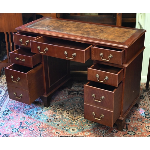 274 - A reproduction mahogany twin pedestal desk with tooled leather top, 104 x 44 x 74 cm h