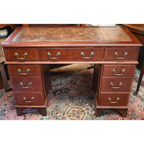 274 - A reproduction mahogany twin pedestal desk with tooled leather top, 104 x 44 x 74 cm h