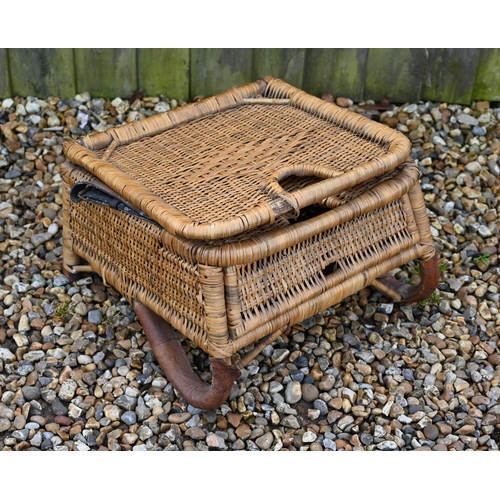 277 - A vintage 1950s rattan wicker fishing chair with folding back supports by two leather straps