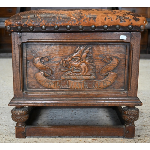 285 - An oak leather top box stool carved with 'Immaculata Gens' Welsh heraldic crest to front (unstained ... 