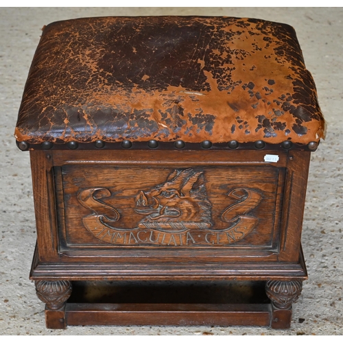 285 - An oak leather top box stool carved with 'Immaculata Gens' Welsh heraldic crest to front (unstained ... 