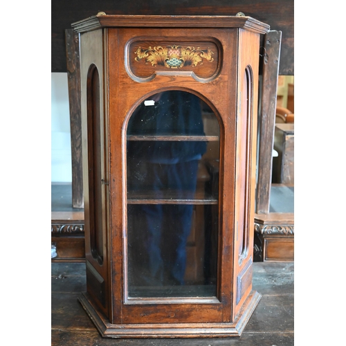 293 - An early 20th century oak wall hanging cabinet painted with heraldic crest over glazed door, 53  x 2... 