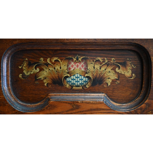 293 - An early 20th century oak wall hanging cabinet painted with heraldic crest over glazed door, 53  x 2... 