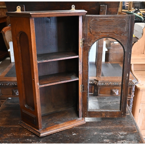 293 - An early 20th century oak wall hanging cabinet painted with heraldic crest over glazed door, 53  x 2... 