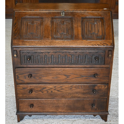 295 - A 'Jaycee Furniture' stamped oak bureau with carved linenfold panels in Tudor manner, 78 x 40 x 78 c... 