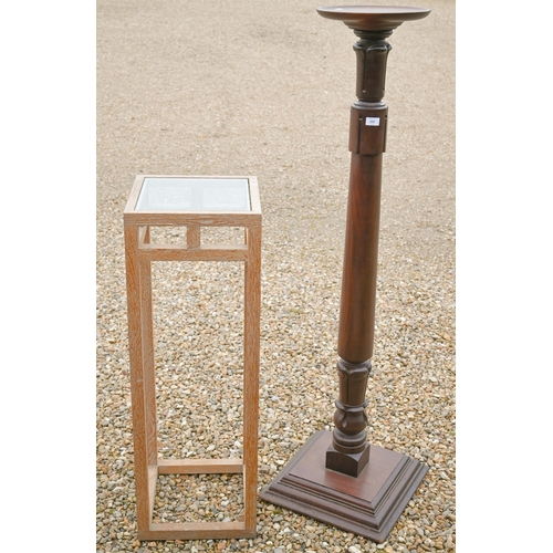 297 - A mahogany jardiniere stand with turned and carved column on square platform base, 150 cm h to/w a m... 