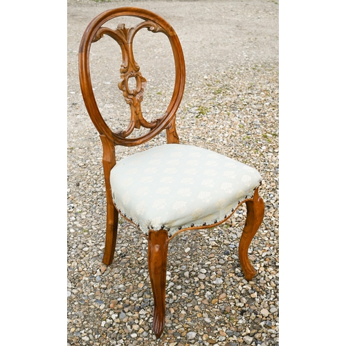 300 - Three mahogany lyre-back dining chairs (1 carver, 2 standard) to/w a carved walnut side chair (4)