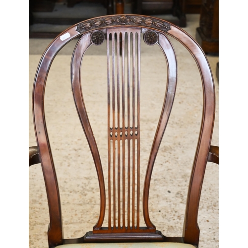 300 - Three mahogany lyre-back dining chairs (1 carver, 2 standard) to/w a carved walnut side chair (4)