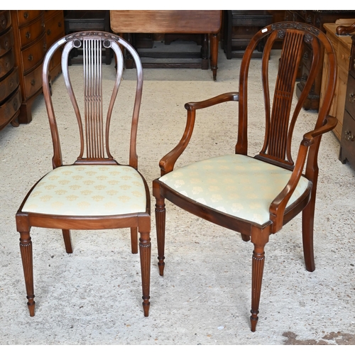 300 - Three mahogany lyre-back dining chairs (1 carver, 2 standard) to/w a carved walnut side chair (4)