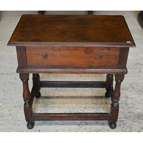 302 - #An antique oak side table with single frieze drawer on turned supports united by stretchers, 78 x 4... 