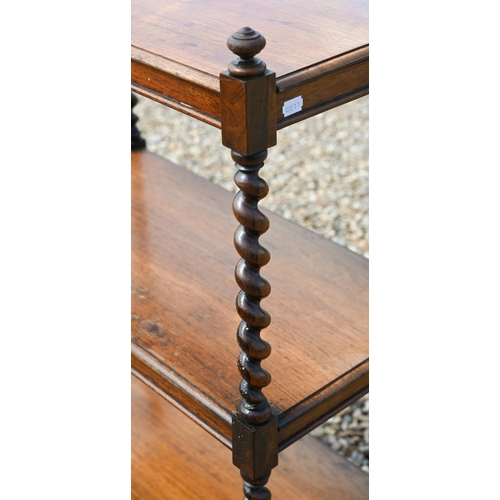 303 - A Victorian rosewood three-tier whatnot with barley twist pillars, short turned legs and brass casto... 